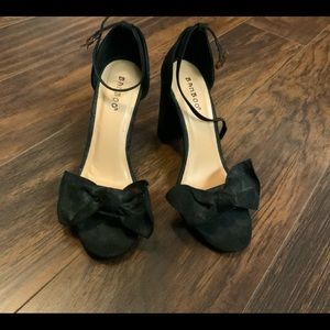 Black block heels with bow over toe strap